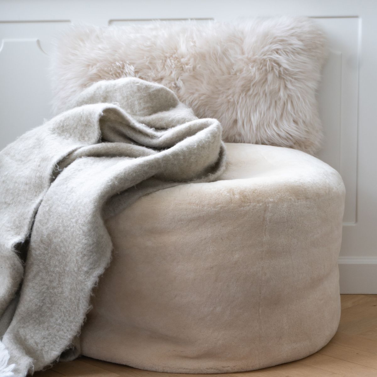Lammfellpouf Premium | Neuseeland | Mokassin | D55x46 cm Kastanie