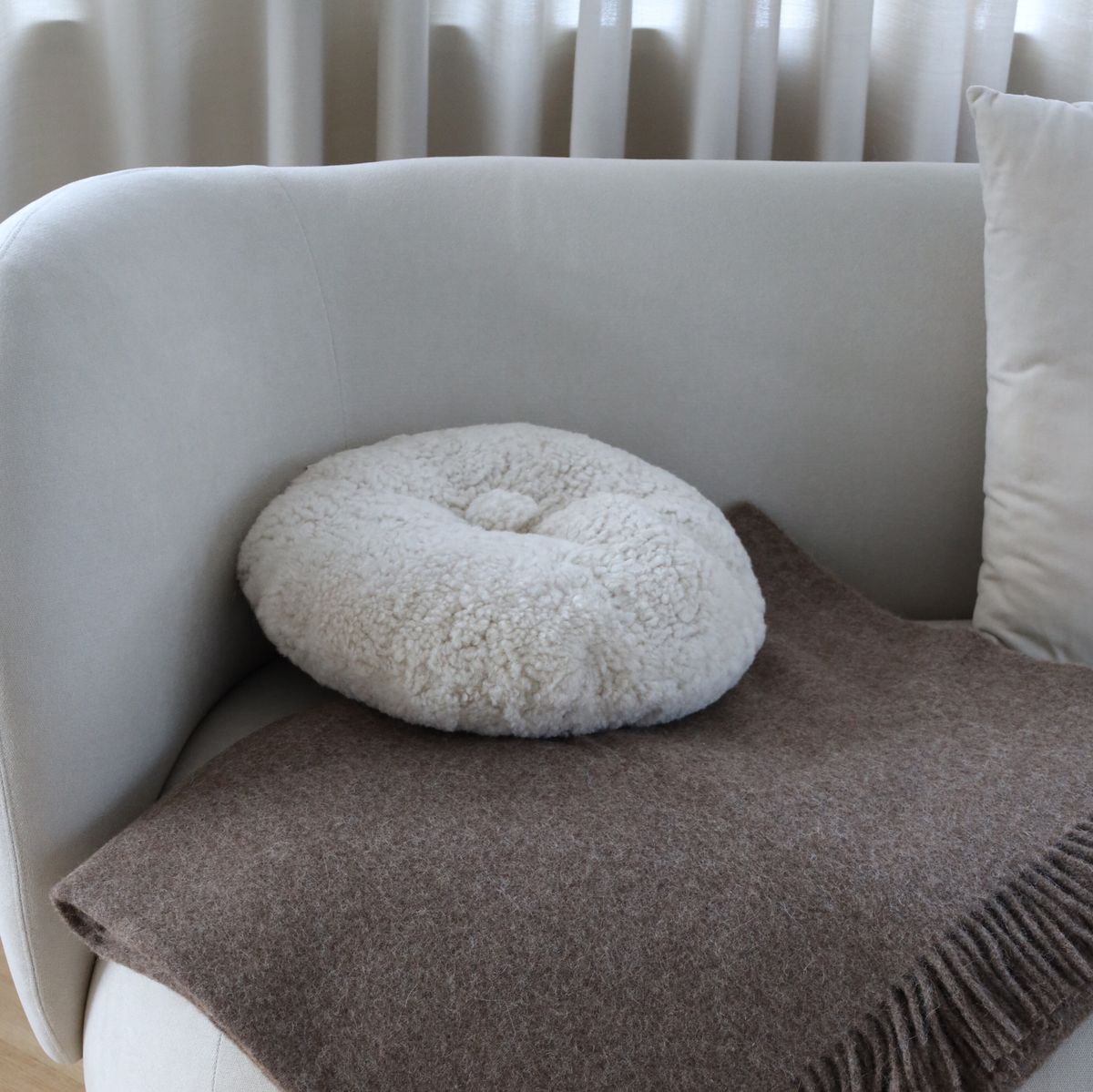 Rundes Fellkissen | Kurzhaar | Neuseeland | Doppelseitig | D40 cm Fellkissen | Sheepskinhouse.ch