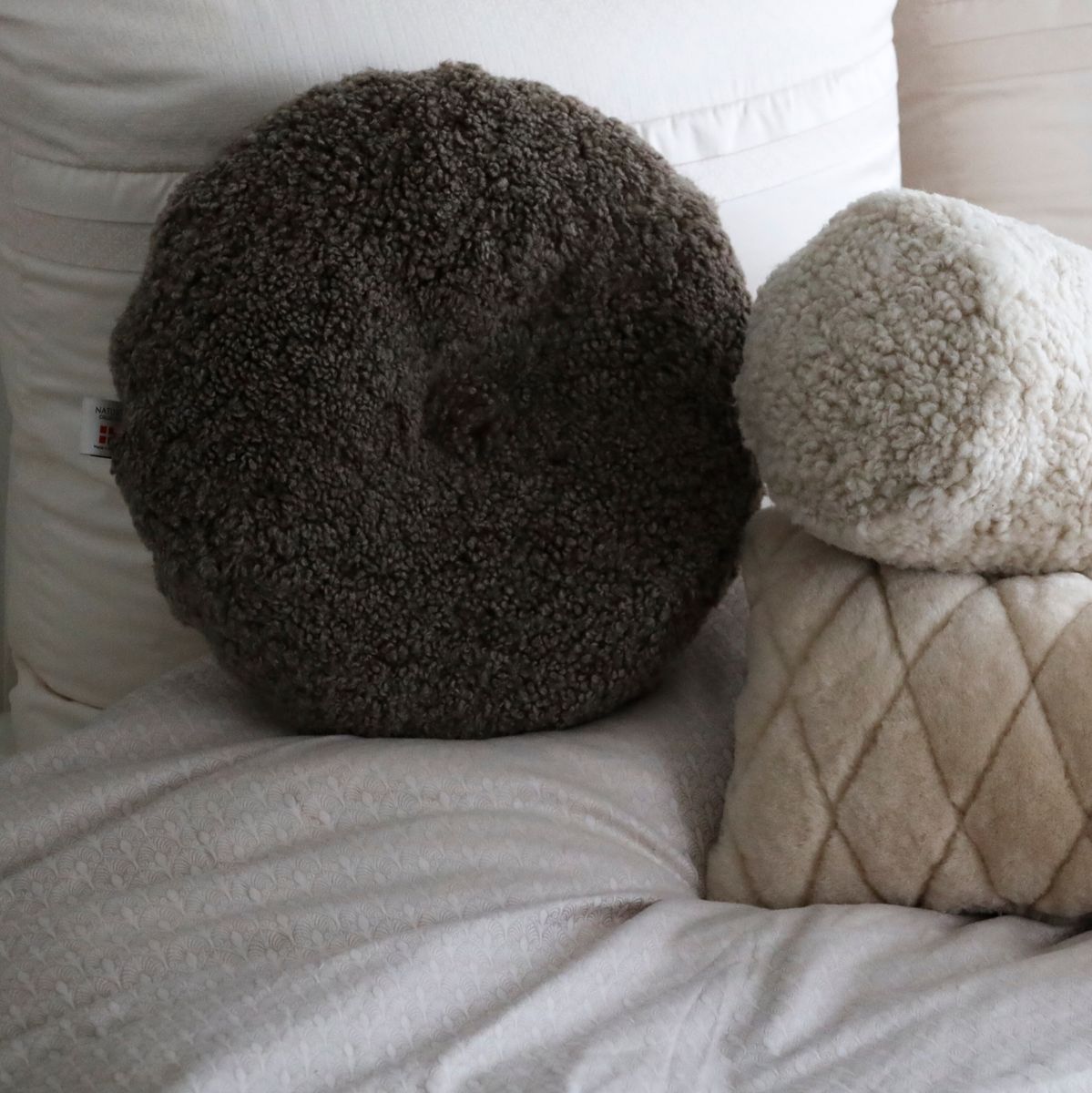 Rundes Fellkissen | Kurzhaar | Neuseeland | Doppelseitig | D40 cm Fellkissen | Sheepskinhouse.ch